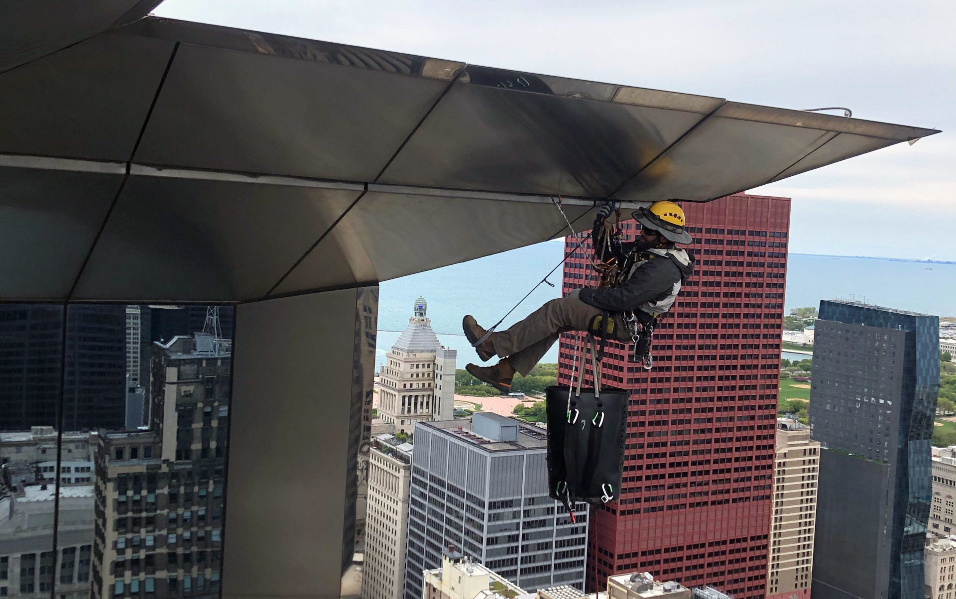 Rope Access Technician on Side of Building