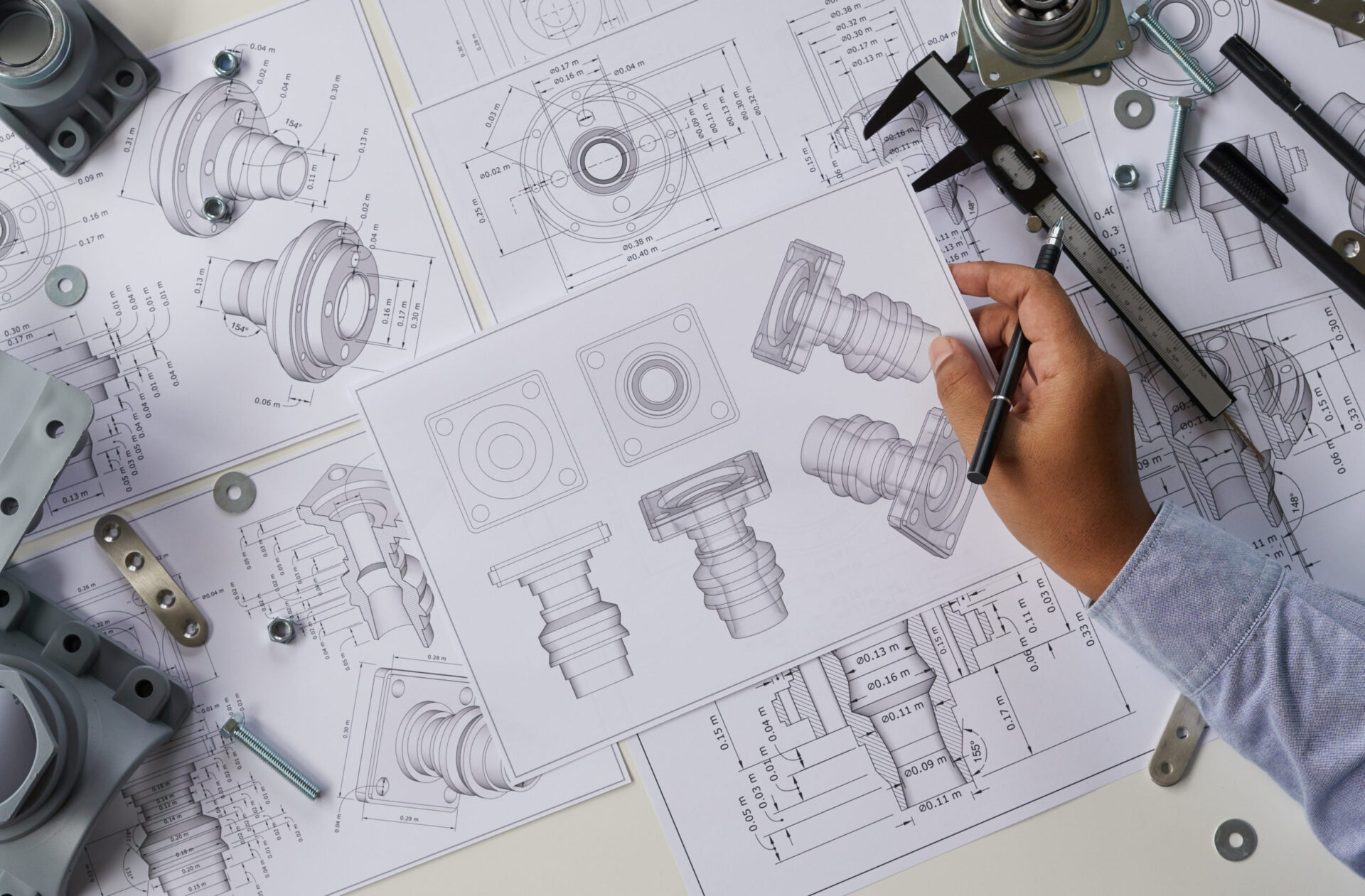 Engineers drawn. Инженер конструктор. Конструктор проектирует. Инженер с чертежами. Профессия инженер конструктор.